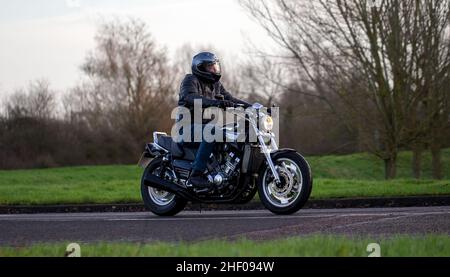 Man Riding Yamaha Man riding a classic Yamaha motorcycle at an annual Classic motorcycle ...