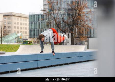 Man practicing parkour in the city Stock Photo