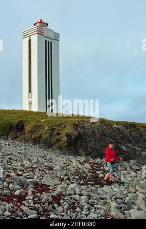 Woman hiking on Kalfshamarsvik peninsula,Iceland,Europe Stock Photo