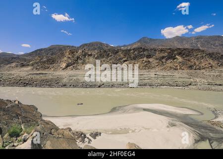 Nice View to the Dirty Water of Mountain River in Gilgit Baltistan Region, Pakistan Stock Photo