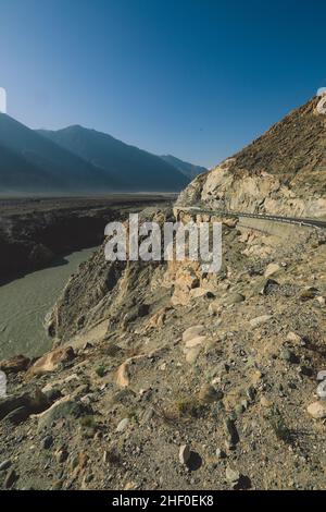 Nice View to the Dirty Water of Mountain River in Gilgit Baltistan Region, Pakistan Stock Photo