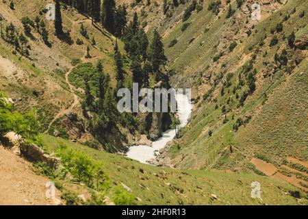 Beautiful View to the Pakistani Highland Gorge with the Mountain River in Gilgit Baltistan Stock Photo