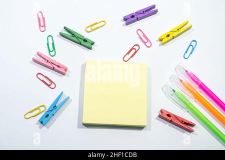 Set of colorful paper clips with white copy space background. Business creativity concepts. Flat lay design, can be used for presentation slides. Stock Photo