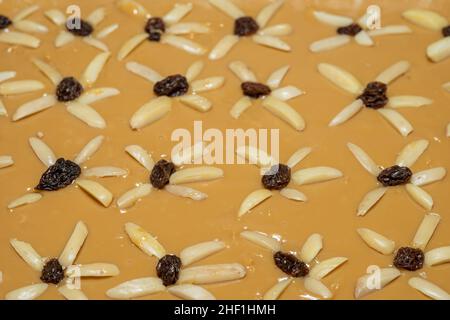 Mazurek is a type of pastry (a cake) baked in Poland, particularly at Easter, but also at other winter holidays. It is generally decorated with icing Stock Photo