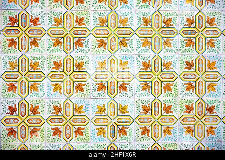 Azulejo is a form of Portuguese and Spanish painted tin-glazed ceramic tilework. Found on the interior and exterior of churches, palaces, houses, scho Stock Photo