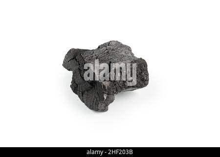 Black oak coal isolated on a white background. Stock Photo