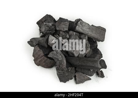 Black oak coal isolated on a white background. Stock Photo