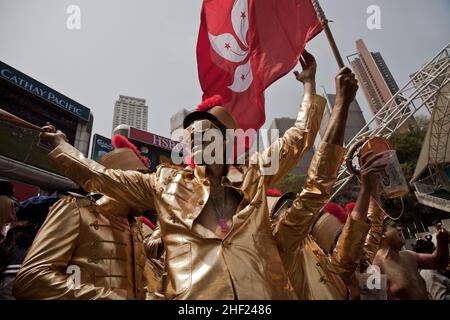 The crowd, at the Hong Kong Stadium, during the Hong Kong Sevens. It is considered the most important 7s rugby tournament in the world. Stock Photo