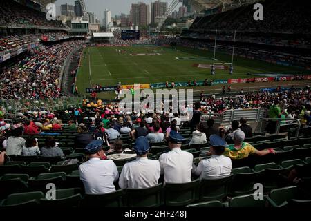 The crowd, at the Hong Kong Stadium, during the Hong Kong Sevens. It is considered the most important 7s rugby tournament in the world. Stock Photo