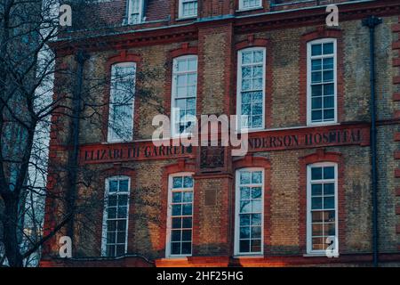 London, UK - January 01, 2022: Name on The Elizabeth Garrett Anderson and Obstetric Hospital, a hospital that is providing healthcare to women in cent Stock Photo