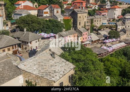 MOSTAR, BOSNIA AND HERZEGOVINA - JUNE 10, 2019: Old stone buildings in Mostar. Bosnia and Herzegovina Stock Photo