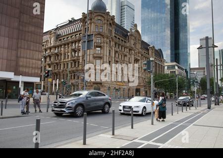 FRANKFURT, GERMANY – AUGUST 28, 2019: Commerzbank bank branch with Galileo and Silberturm skyscrapers in the background. Stock Photo