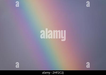 a close up image of a vertical rainbow after a thunderstorm over the Mediterranean sea Stock Photo