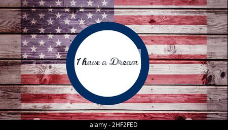 I have a dream text in white circle over american flag on wooden table Stock Photo