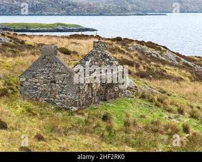 Ruins of an old croft house on coast at Moilingeanais, Isle of Harris, Scotland, UK Stock Photo