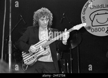 Englis guitarist Albert Lee performing at a charity jam at the Town & Country Club, London, England in 1987. Stock Photo