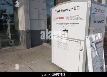 Located outside public library, drop box for completed at-home Covid PCR tests (free at library when available). Test kits are picked up every night and sent to lab. Results emailed within a few days. Cleveland Park, Washington, DC, Jan. 13, 2022 Stock Photo