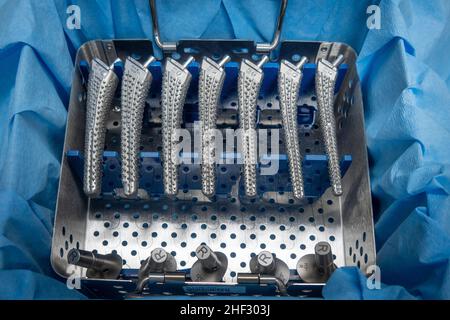 some surgical rasps for a transfemoral prosthesis lie in an instrument ...