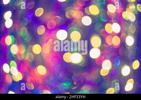 Abstract festive elegant background of blurred with bokeh lights on dark blue background, defocused Stock Photo