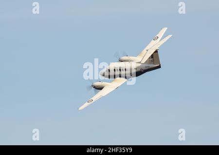 Royal Air Force, RAF, Beechcraft B200 King Air plane ZK450 flying at an airshow. Multi-Engined Training Squadron (METS) operated by Serco Stock Photo