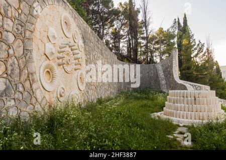 MOSTAR, BOSNIA AND HERZEGOVINA - JUNE 10, 2019: Crumbling Partisan's Cemetery in Mostar, Bosnia and Herzegovina Stock Photo