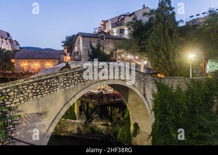 Evening view of Kriva cuprija (Crooked bridge) in Mostar. Bosnia and Herzegovina Stock Photo