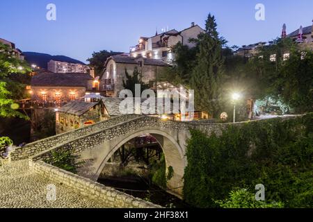 Evening view of Kriva cuprija (Crooked bridge) in Mostar. Bosnia and Herzegovina Stock Photo