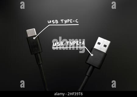 Connecting cables usb type C and type A wires. Popular technological standard Stock Photo