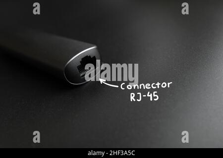 A popular connector rj-45 for transmitting information and the Internet via cable. Stock Photo