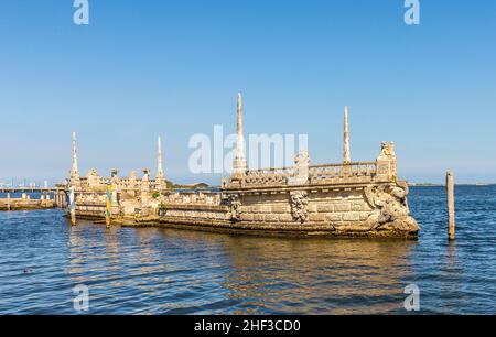 Stone breakwater barge at the Vizcaya Museum and Gardens on Biscayne Bay in the present day Coconut Grove neighborhood of Miami, Florida. Stock Photo