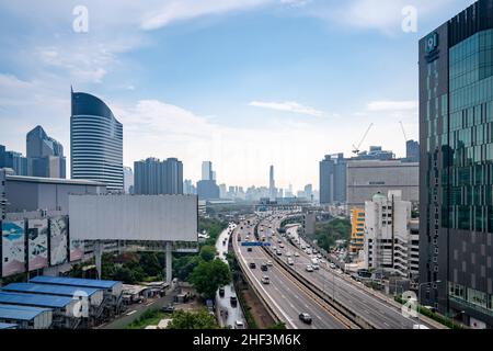 BANGKOK, THAILAND - 30 April, 2021: Cityscape Arial Building view flowing traffic situation on Sirat express way in Friday afternoon shot from ShowDC Stock Photo