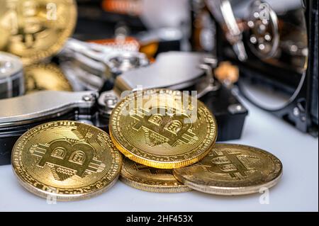 Bitcoin BTC on an open hard drive, cryptocurrency business concept, close-up Stock Photo