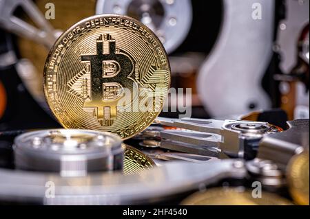 Bitcoin BTC on an open hard drive, cryptocurrency business concept, close-up Stock Photo