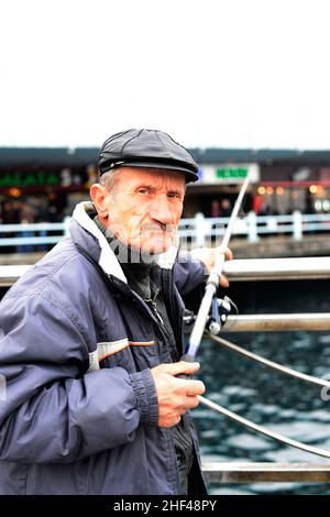 Portrait of a Turkish man taken by the Galata bridge in Istanbul, Turkey. Stock Photo