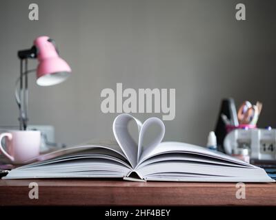 Heart symbol made from a book with copy space for text Stock Photo