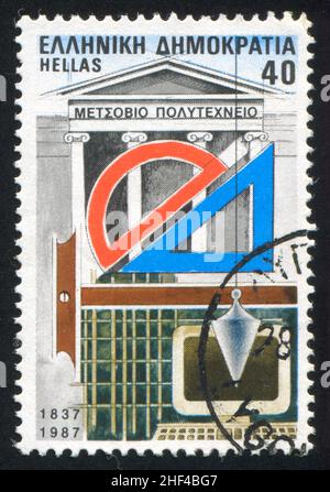 GREECE - CIRCA 1987: stamp printed by Greece, shows The National Metsovio Polytechnic Institute, symbols of science, circa 1987 Stock Photo