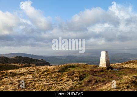 The trig point at the summit of Benarty Hill, Fife, Scotland Stock Photo