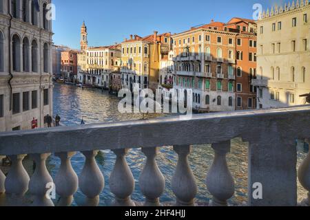 Stunning view of the Venice skyline with the Grand Canal during sunset. Picture taken from Ponte di Rialto. A seagull in evidence on the foreground Stock Photo