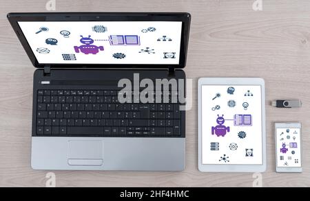 Machine learning concept shown on different information technology devices Stock Photo