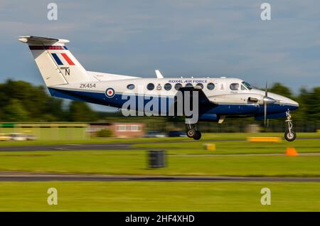 Royal Air Force, RAF, Beechcraft B200 King Air plane ZK454 flying at an airshow, landing at RAF Waddington. Serco operated 45 Squadron airplane Stock Photo