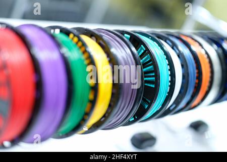Coils with bright multi-colored wire, close-up, blurry Stock Photo