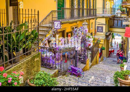 Bellagio borgo on Lake Como, Italy. Alley and stores. Stock Photo