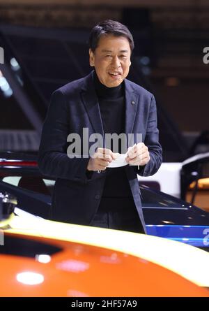 Chiba, Japan. 14th Jan, 2022. Japan's automobile giant Nissan Motor president Makoto Uchida smiles as he unveils the prototype sports car 'Fairlady Z Customized Proto' at the Tokyo Auto Salon in Chiba, suburban Tokyo on Friday, January 14, 2022. An annual custom car show started a three-day live event for the first time in two years. Credit: Yoshio Tsunoda/AFLO/Alamy Live News Stock Photo