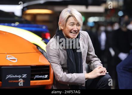 Chiba, Japan. 14th Jan, 2022. Japan's motor racing team Kondo Racing owner Masahiko Kondo smiles as he unveil Nissan Motor's prototype sports car 'Fairlady Z Customized Proto' at the Tokyo Auto Salon in Chiba, suburban Tokyo on Friday, January 14, 2022. An annual custom car show started a three-day live event for the first time in two years. Credit: Yoshio Tsunoda/AFLO/Alamy Live News Stock Photo