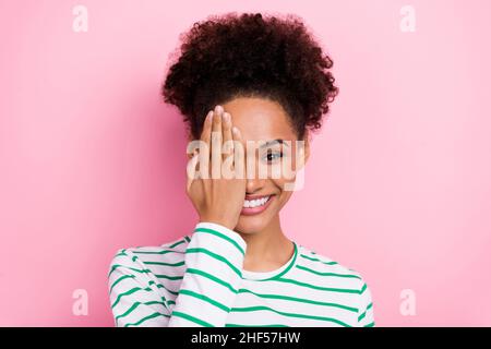 Photo of lovely bun hairstyle millennial lady close face wear white shirt isolated on pink color background Stock Photo