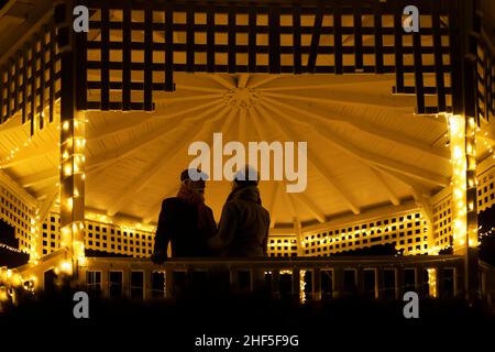 A man and a woman talking in a romantic atmosphere Stock Photo