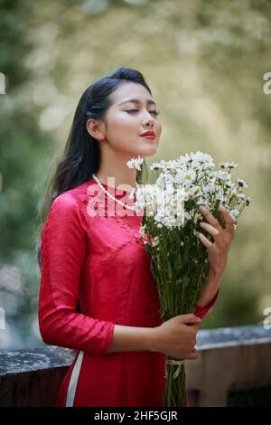 Ho Chi Minh city, Viet Nam: Ao Dai, Beautiful girl in Vietnamese traditional costume Stock Photo