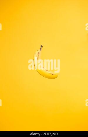 banana on yellow background Stock Photo