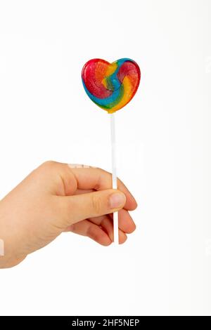 Heart shaped lollipop on white background Stock Photo