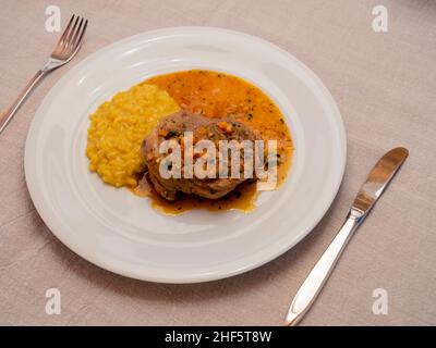 Ossobuco a la milanese with Risotto, Braised Veal Shank Stock Photo